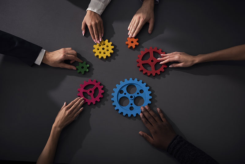 business-team-connect-pieces-gears-teamwork-partnership-integration-concept 